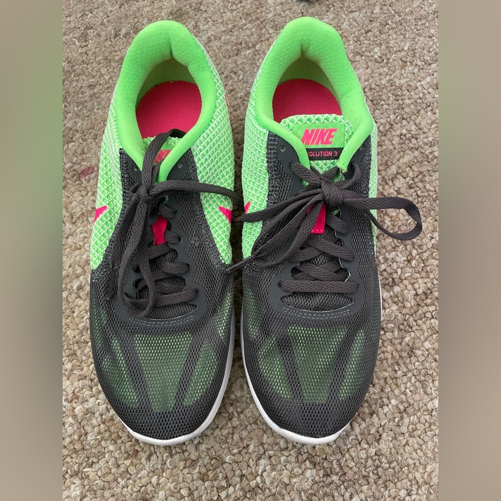 Size W7 Nike running sneaker. basically new